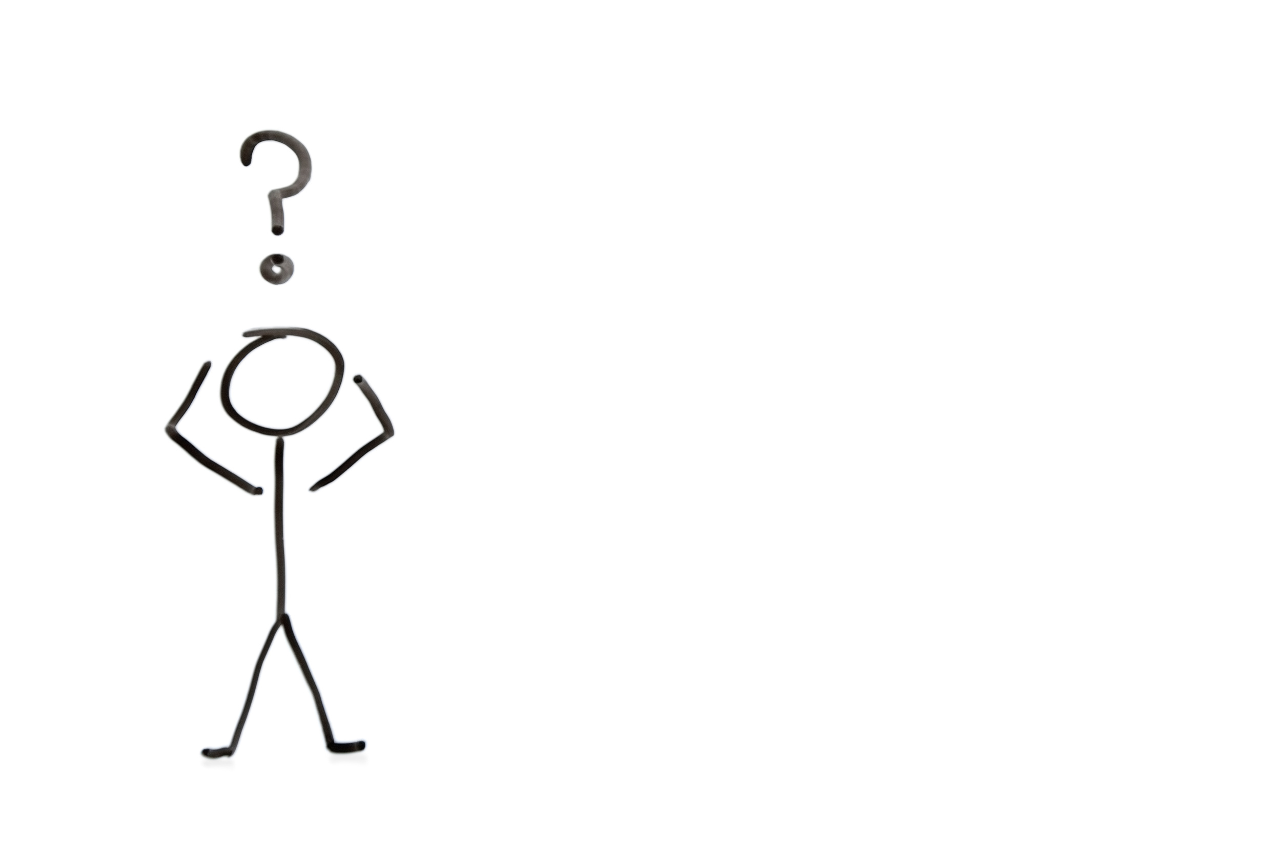 Stick figure with question mark depicting confusion over white background